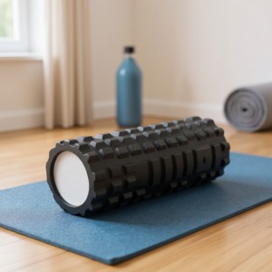 Schaumstoffrolle zur Massage für die Yogamatte