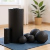 Set mit Massagerollen für die Yogamatte
